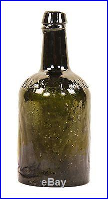 1840's Black Glass Quart Bottle By New York Bottlers Clarke & White