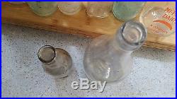 2 antique embossed glass bottles John Nacey Oswego New York pair large & small