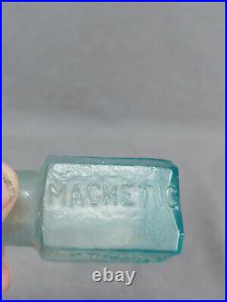 A. Trasks Magnetic Ointment New York Aqua Pontiled Medicine Bottle Backwards Ns