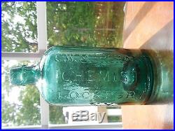 Antique Bottle Embossed G. W. Merchant Chemist Lockport N. Y. Swirls Seeds Aqua 7