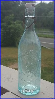 Antique-blobtop Bottle-emb-native American Face-colonial Bottling-new York