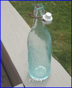 Antique-blobtop Bottle-emb-native American Face-colonial Bottling-new York
