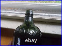 Clarke & Co New York Curved Shoulder Emb 1860 Blackglass Mineral Water Bottle