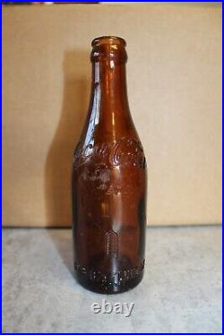 Coca-Cola Straight Sided AMBER BUFFALO NEW YORK WITH ARROWS