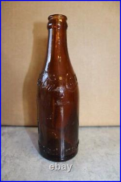 Coca-Cola Straight Sided AMBER BUFFALO NEW YORK WITH ARROWS