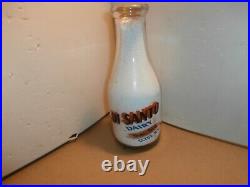 Di Santo Dairy quart Milk bottle, 2 color, full cow Clyde, N. Y. Great Graphics