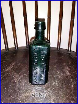 Early C. W Merchant Chemist Bottle Lockport, NY Crude Green Glass Medicine Bottle