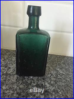 From The Laboratory Of G. W. Merchant Chemist, Lockport, N. Y. Cure Bottle