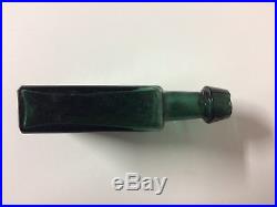 G. W. Merchant Lock Port N. Y. 1840 to 1872 Dark Green Bottle