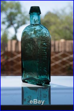 Great Color! G. W. MERCHANT LOCKPORT. N. Y. Tombstone Blue-Green Shiny Glass