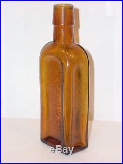 Holy Grail Honey Amber Gargling Oil Lock Port N. Y. Bottle