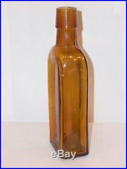 Holy Grail Honey Amber Gargling Oil Lock Port N. Y. Bottle
