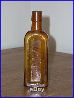 Honey Amber Merchant's Gargling Oil Lockport NY Bottle 5 1/16 Inches Tall
