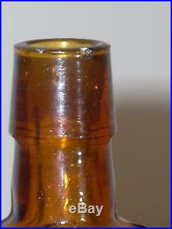 Honey Amber Merchant's Gargling Oil Lockport NY Bottle 5 1/16 Inches Tall