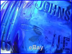 JOHNSON AND JOHNSON NEW YORK SHADED SAPPHIRE BLUE JAR