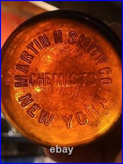 Large Embossed Martin H. Smith Co. Chemists New York Empty Amber Bottle