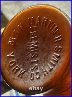 Large Embossed Martin H. Smith Co. Chemists New York Empty Amber Bottle