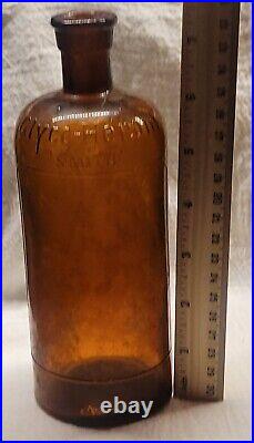 Large Embossed Martin H. Smith Co. Chemists New York Empty Amber Bottle