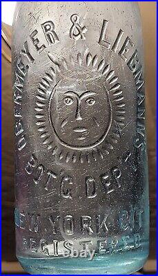 Nice Obermeyer & Liebmann's Embossed Sunface Graphics New York City Ny Bottle