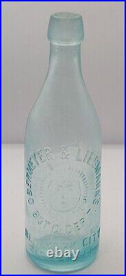 Nice Obermeyer & Liebmann's Embossed Sunface Graphics New York City Ny Bottle