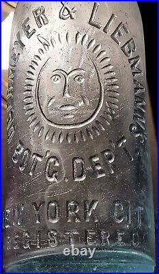 Nice Obermeyer & Liebmann's Embossed Sunface Graphics New York City Ny Bottle