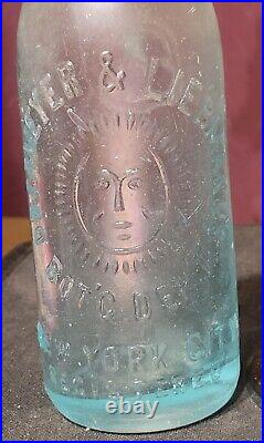 Nice Obermeyer & Liebmann's Embossed Sunface Graphics New York City Ny Bottle