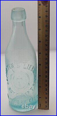 Nice Obermeyer & Liebmann's Embossed Sunface Graphics New York City Ny Bottle