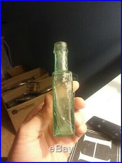 Open Pontiled G. W. Merchant Lockport, N. Y. MEDICINE bottle Extremely Crude