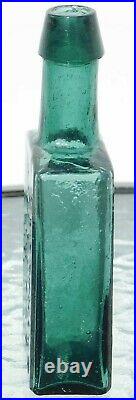 Pre 1900's Open Pontil Medicine Bottle G. W. Merchant Lockport, N. Y. Dark Teal
