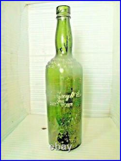 R. H. Macy & Co Inc, NEW YORK Liquor bottle Green Glass 11 1/2 in 1938 Whiskey