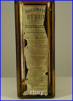 Rheumatic syrup 1882, Rochester N. Y. Bottle with embossed tree, full front label
