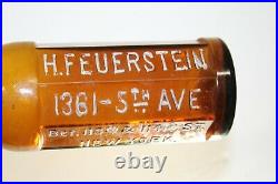 Scarce Amber Paneled Cylinder Whiskey Bottle H Feuerstein New York 12'