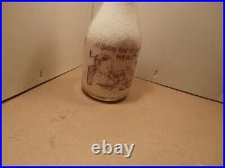 Te Cromey Dairy quart milk bottle, Clymer, N. Y. Baby's health