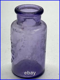 Vintage Purple Antidollar Mfg. Co Springville N. Y. 1st Novacain Dental Bottle