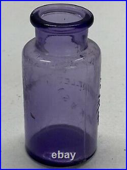 Vintage Purple Antidollar Mfg. Co Springville N. Y. 1st Novacain Dental Bottle